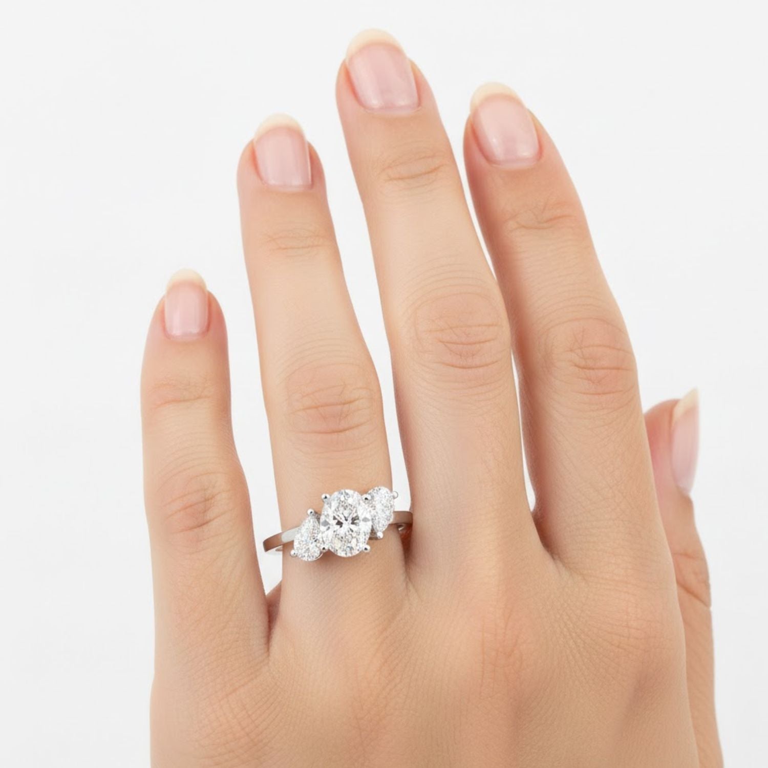 Lab Grown Diamond 1.50 CTW Pear Three Stone Ring- Sterling Silver