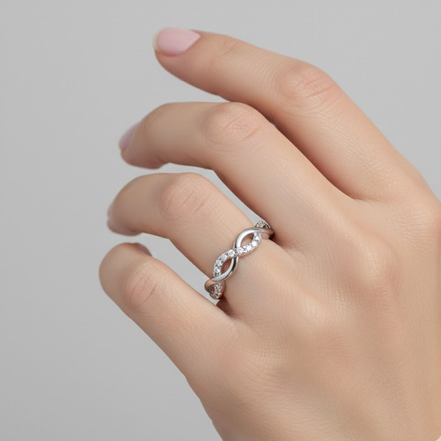 Lab Grown Diamond 0.10 CTW Infinity Twist Pavé Band Ring- Sterling Silver
