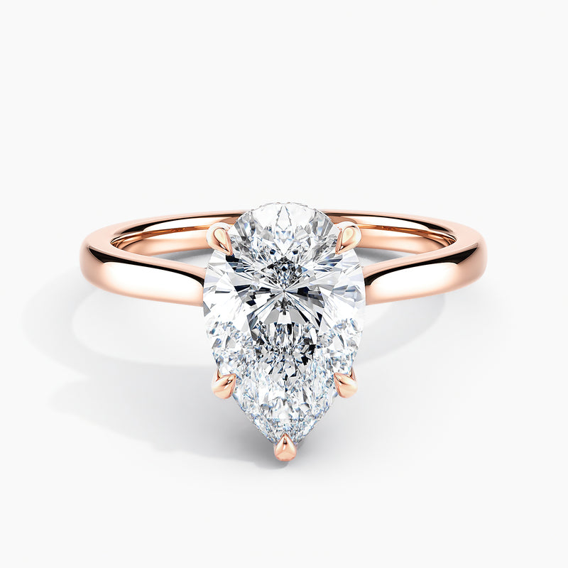 Tapered Classic Pear Diamond Hidden Halo Engagement Ring