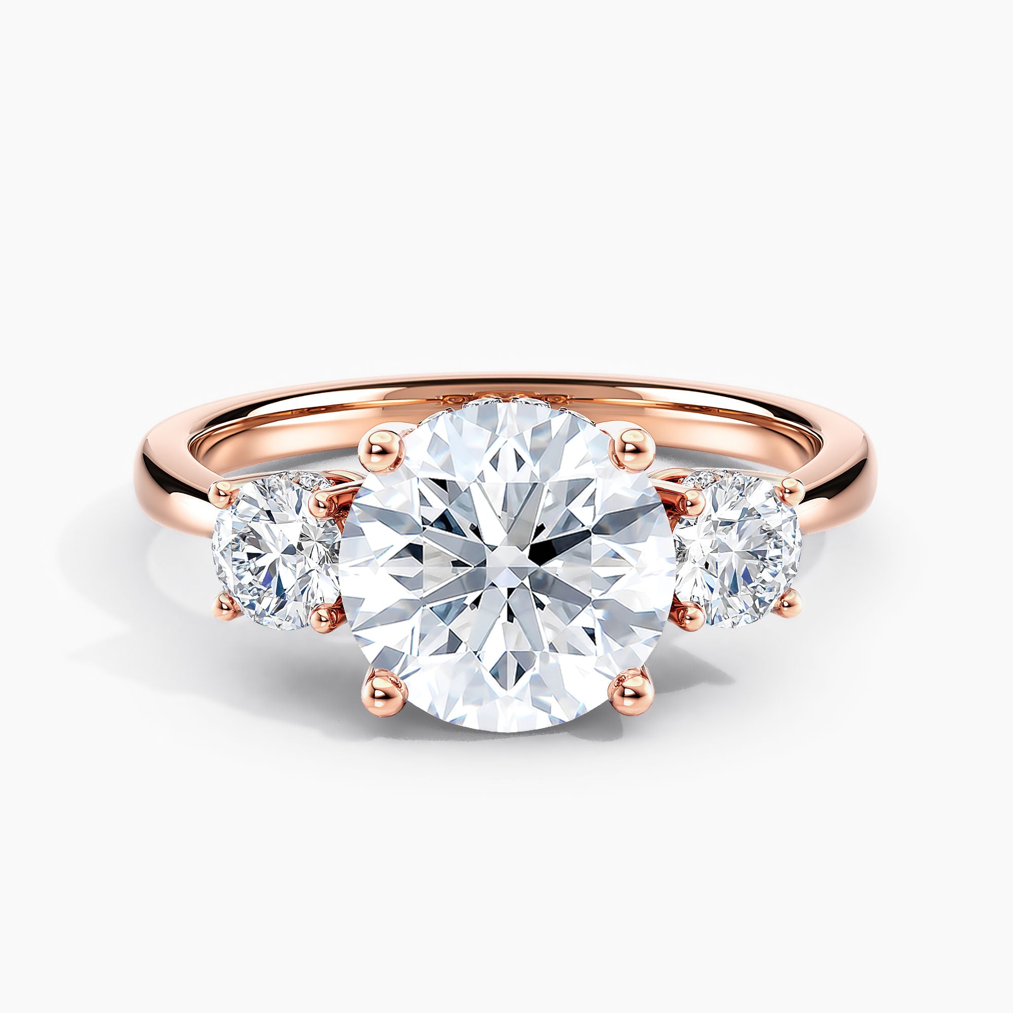 Tapered Three Stone Round Diamond Hidden Halo Engagement Ring