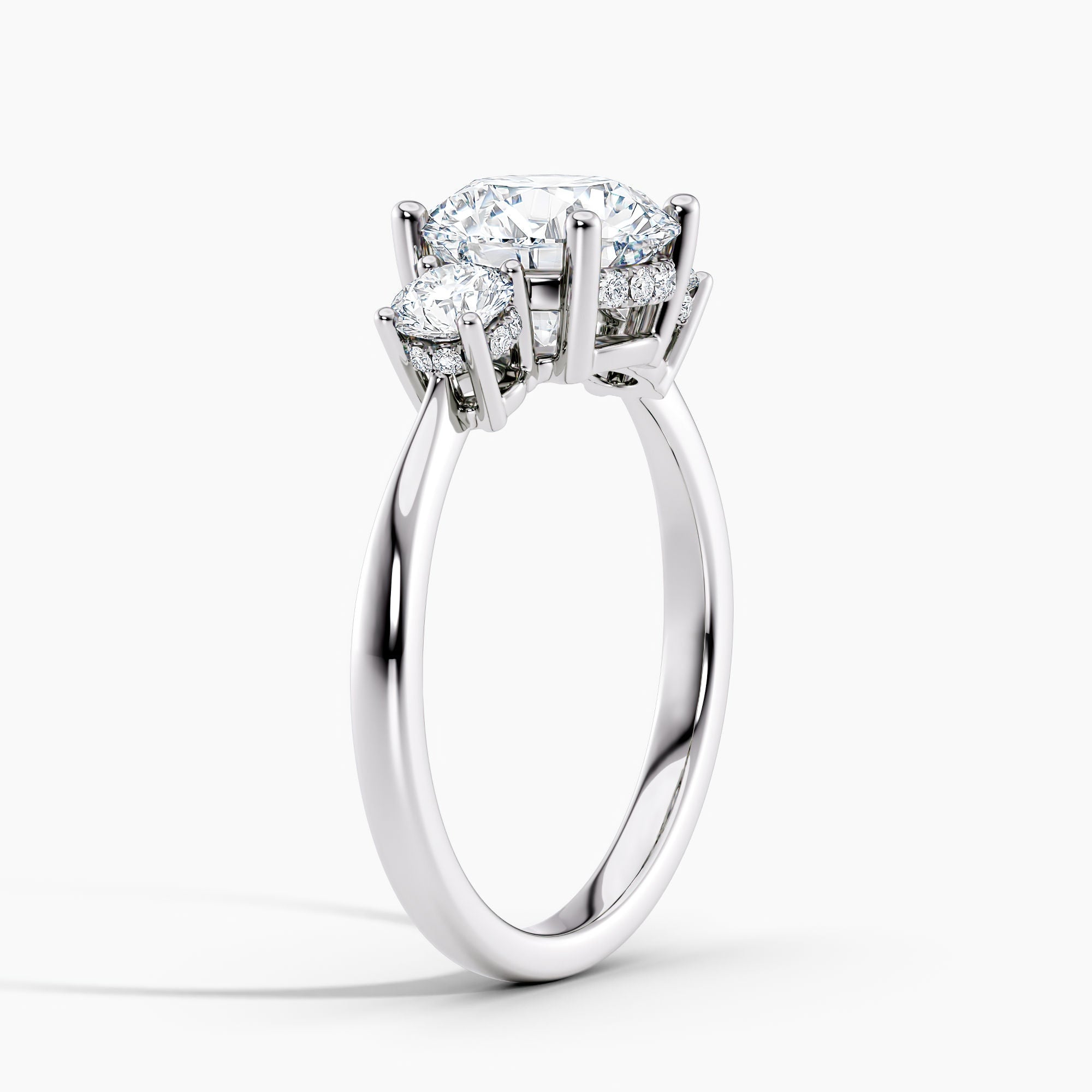 Tapered Three Stone Round Diamond Hidden Halo Engagement Ring