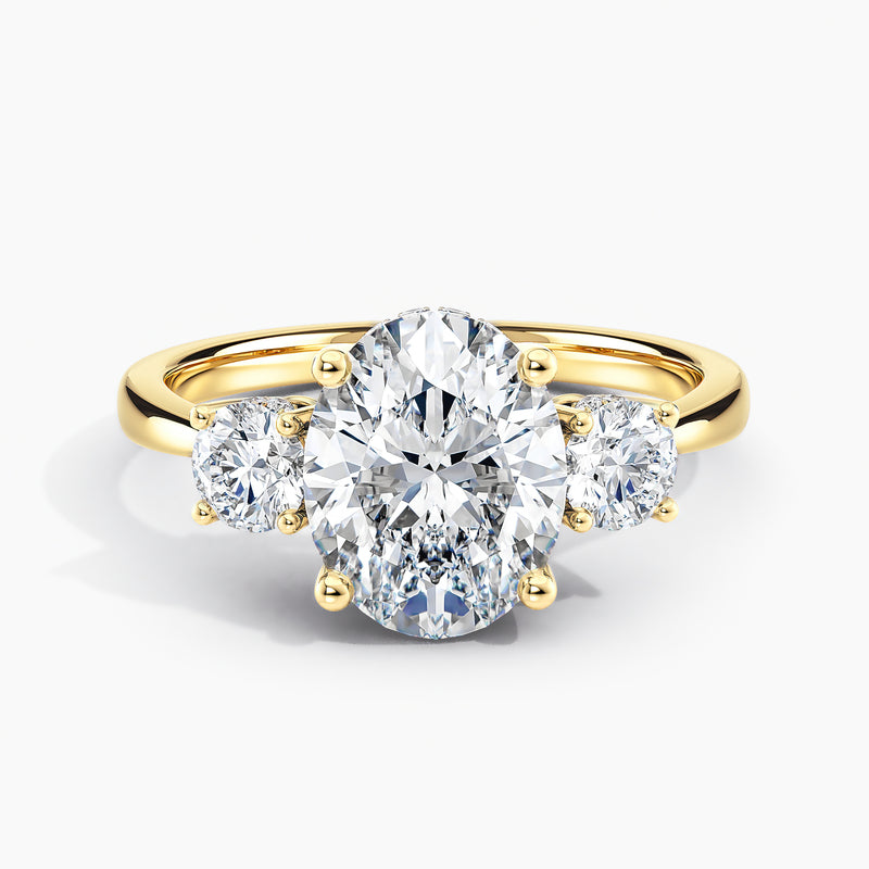 Tapered Three Stone Oval Diamond Hidden Halo Engagement Ring