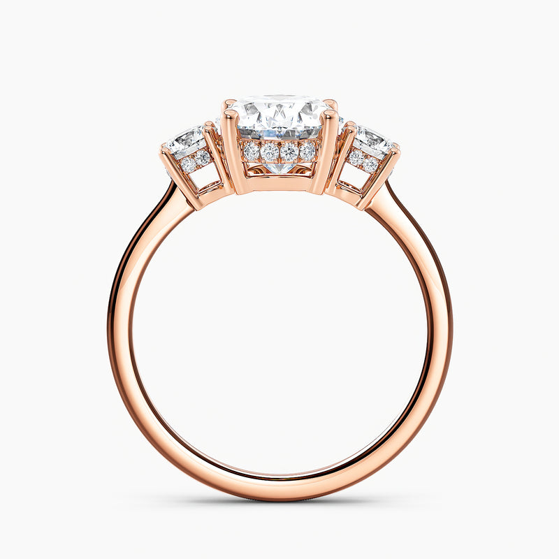 Tapered Three Stone Oval Diamond Hidden Halo Engagement Ring
