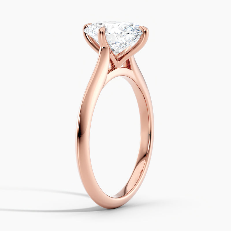East-West Knife Edge Oval Solitaire Engagement Ring