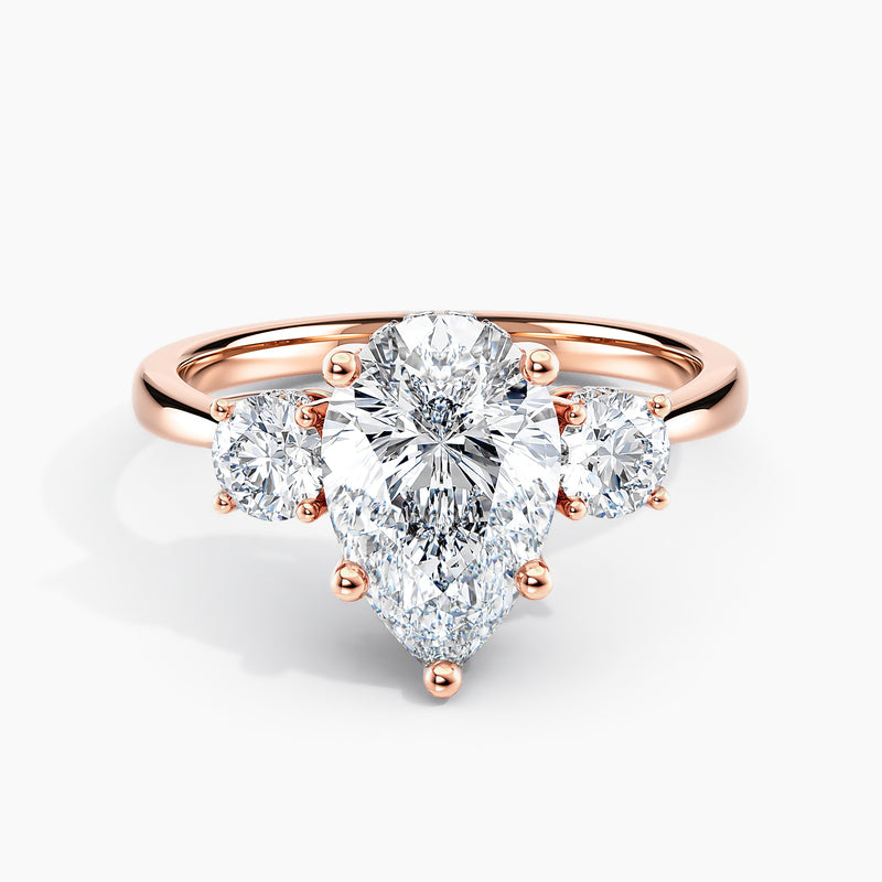 Tapered Three Stone Hidden Halo Pear Diamond Engagement Ring