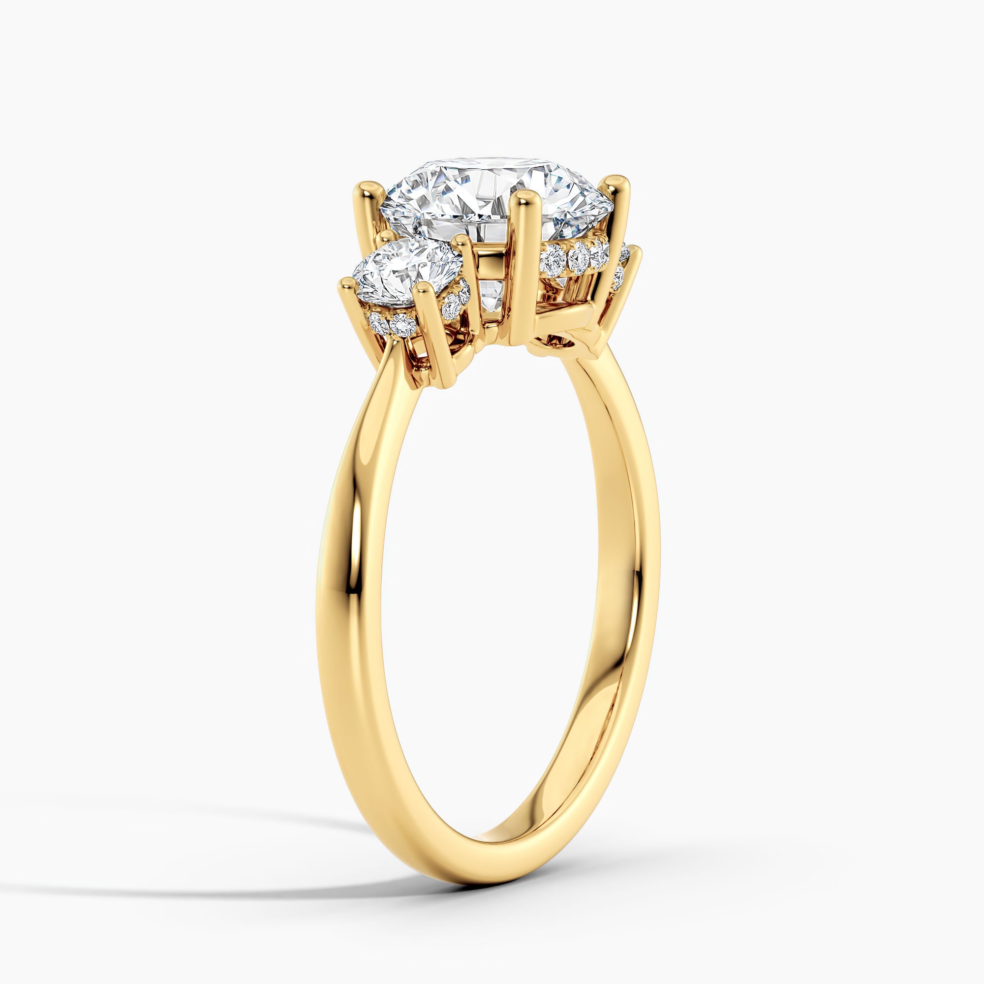 Tapered Three Stone Round Diamond Hidden Halo Engagement Ring