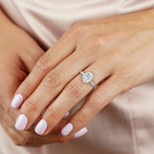 Load image into Gallery viewer, Tapered Classic Hidden Halo Oval Diamond Engagement Ring
