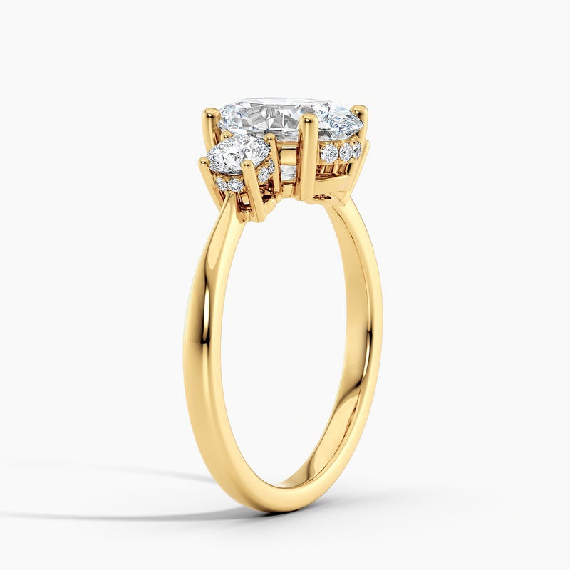 Tapered Three Stone Oval Diamond Hidden Halo Engagement Ring