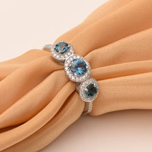 Load image into Gallery viewer, London Blue Topaz Triple Halo Design Ring – Sterling Silver
